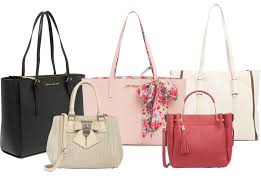 š Win the Style Game with Nordstrom Rackās Best Bag Deals A collection of five stylish handbags. From left to right: black tote, beige with studs, pink with scarf, red with tassels, white tote. Feminine and chic.